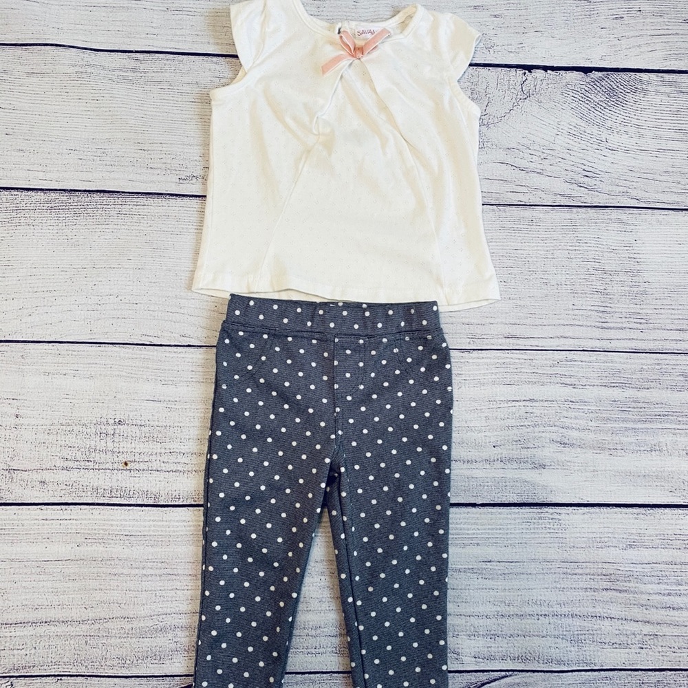 White top with bow and matching polka dot jeggings